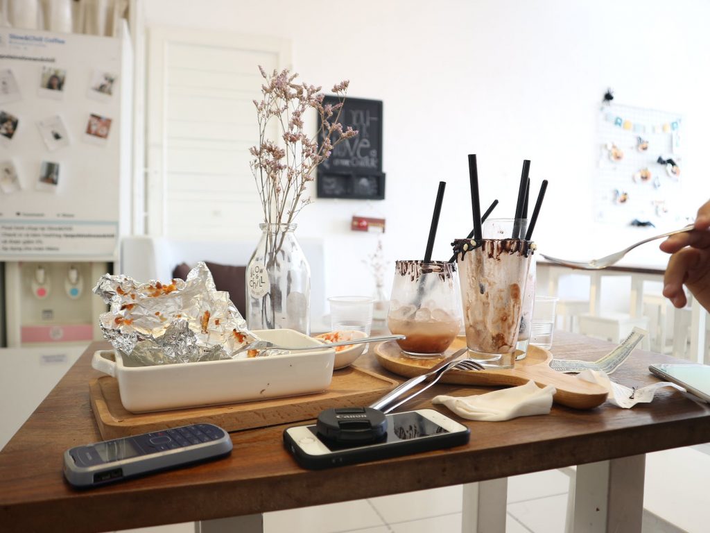 empty glasses and plates on table